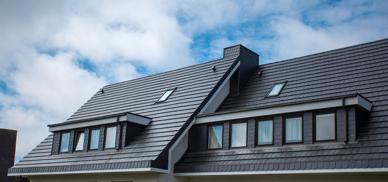 Modern roof against blue sky